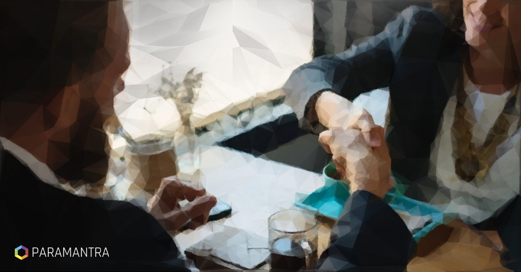 Hiring manager using a sales interview checklist during an interview